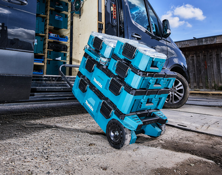 Two builders working with Makita tool